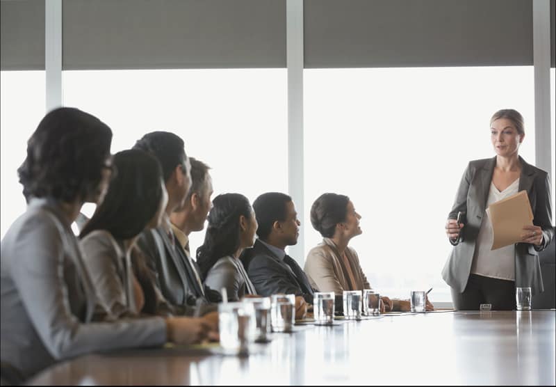 Treat your employees like adults — don't withold bad news female ceo leads a meeting